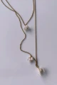 33-naszyjniki-z-perel-decolove-pearl-bell-necklaces.jpg